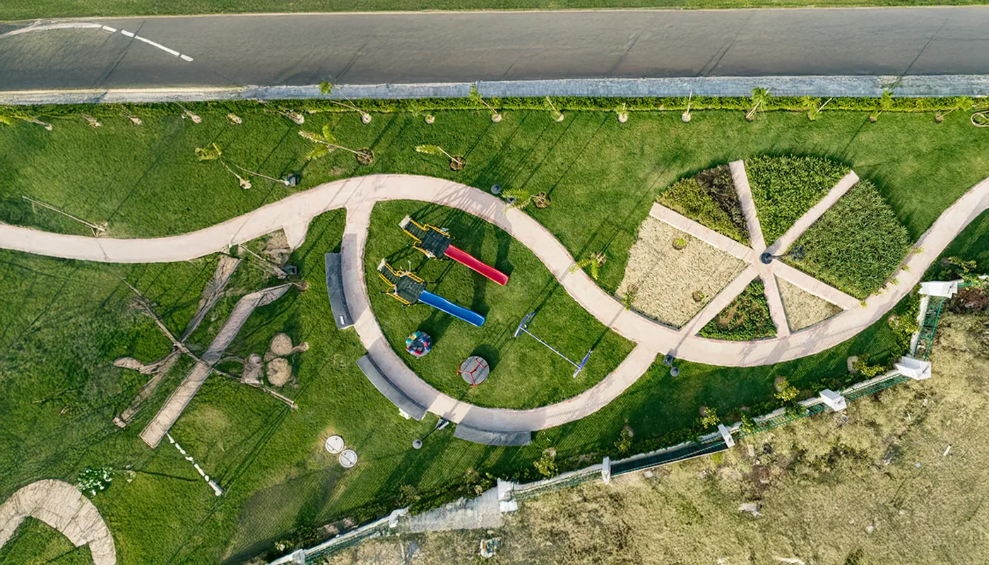 Okas Sukoon – RERA approved gated residential plots with play area in Sushant Golf City, Lucknow
